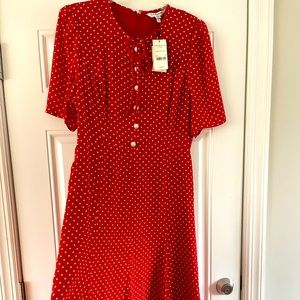 Brand new with tags. Size is too big now. Pearl button detail.